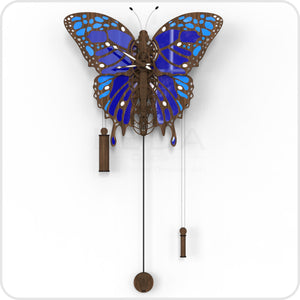 Butterfly pendulum wall clock with dark blue and light blue patterns