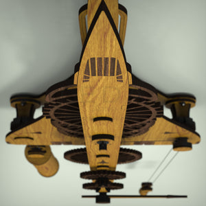 Concorde wooden clock, front view showing the detailed cockpit in walnut marquetry