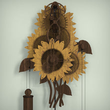 Load image into Gallery viewer, Front view of sunflower mechanical wall clock finished in oak and walnut