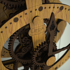 Wooden clock showing wooden gears with treble clef centres