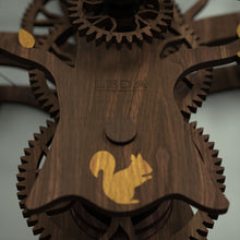 Load image into Gallery viewer, LEDA Logo etched onto the front face of the walnut Tree Of Life wooden clock